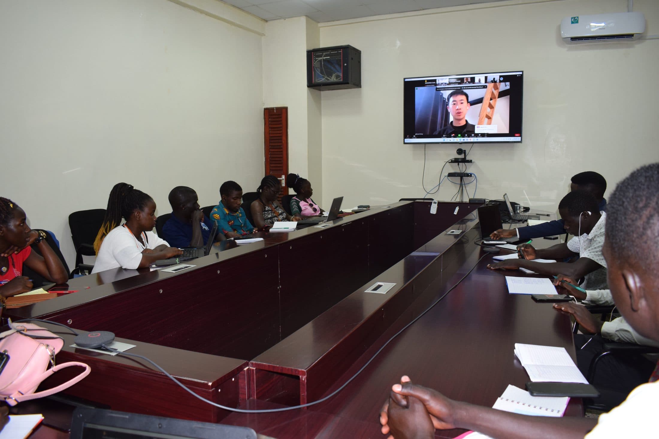 Daniel Zhang joining the African Science Research Bootcamp (ASRB) cohort by video call, Uganda, 2022.